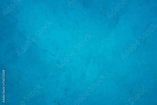 Dark blue concrete stone texture for background in summer wallpaper. Cement and sand wall of tone vintage minimal. Concrete abstract wall of light cyan color, cement texture mint green for design. © Manitchaya