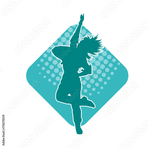 Silhouette of a female dancer in action pose. Silhouette of a woman dancing happily.