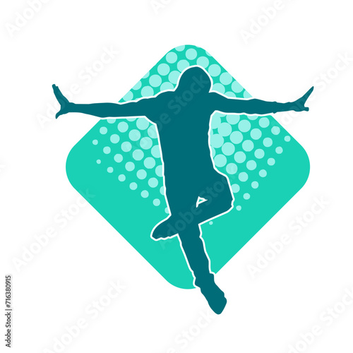Silhouette of a slim man dancing pose. Silhouette of a male dancer in action pose.