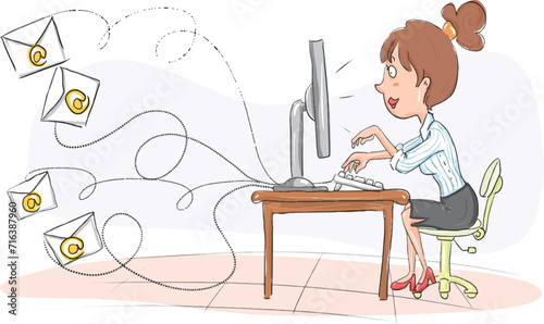 A woman is sending an e-mail from her computer.