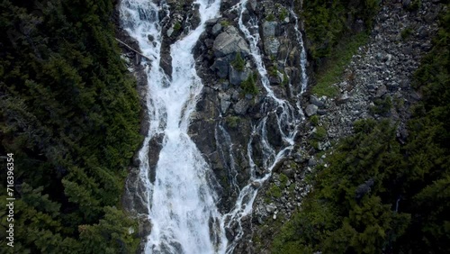 Drone Top View of Water Cascading Down Over Rocks in Canada