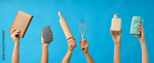 Kitchen utensils of the cook in the hands of women.