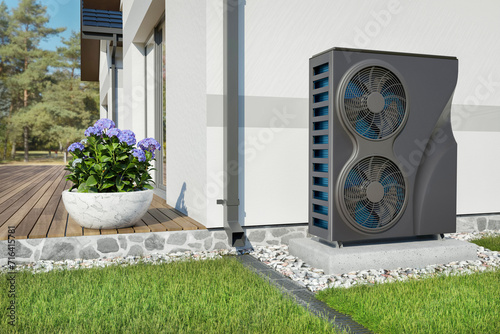 Double size black heat pump stays beside a wall of a cottage - 3d rendering