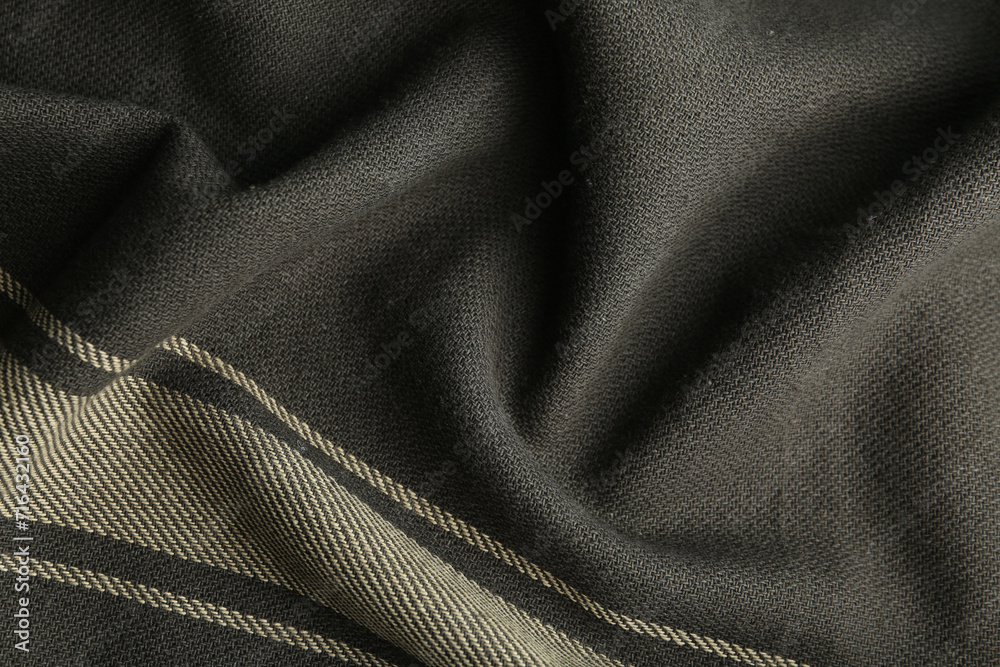 Texture of dark fabric with stripes as background, closeup