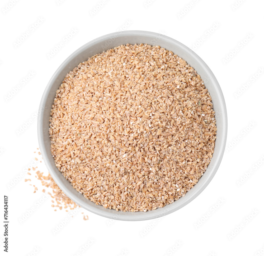 Dry wheat groats in bowl isolated on white, top view Dry wheat groats in bowl isolated on white, top view