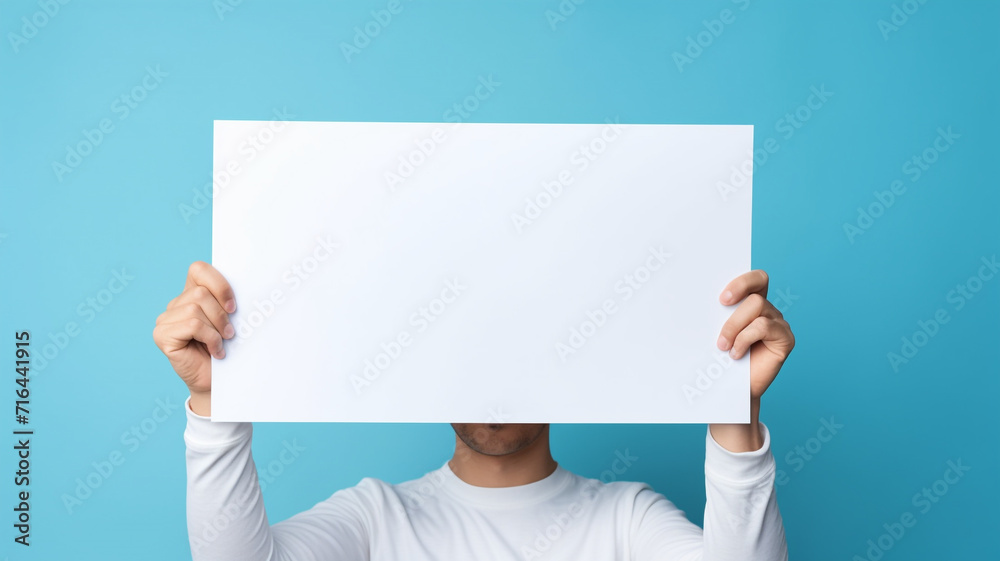 a woman hand holding a blank placard sign poster paper a woman hand holding a blank placard sign poster paper