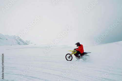 Winter motocross. Racers ride on ice. Winter sports.