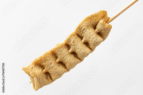 Konstfotografi Skewered fish cake on white background