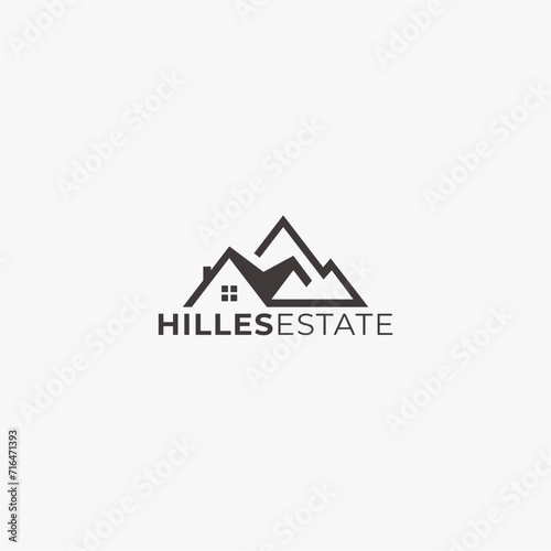 real estate logo design with mountain elements with house roof