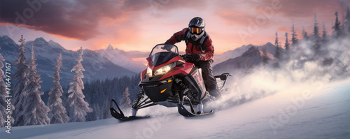 Winter snowmobile extreme fun moto sport. Snowmobile rider driving very fast in winter land photo