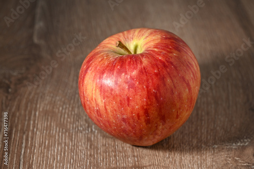 red apples on a wooden table 2