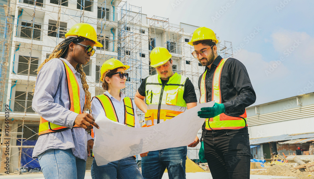 Construction Worker Understanding Team architects multi ethnic workers men and women meeting ...