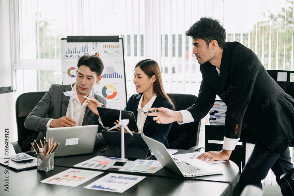 Discussion among businesspeople on the latest developments in solar cell panel technology and Solar Energy Environment city Concept. Discussion among businesspeople on the latest developments in solar cell panel technology and Solar Energy Environment city Concept.