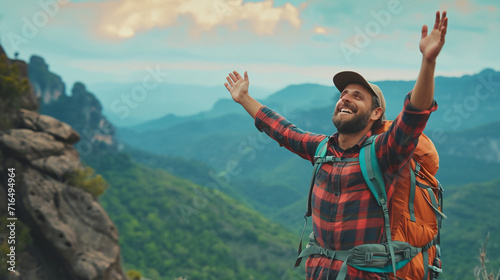 Happy man on the top of mountain. 