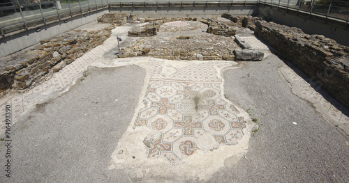 Remains of a mosaic in the ruins of the Basilica della Corte in old town of Grado, Italy.