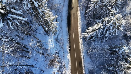 SLO MO AERIAL Above the frozen agricultural landscape after a flood on a sunny morning in winter
