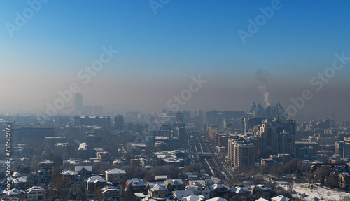 Strong smog over the Kazakh city of Almaty on a winter day