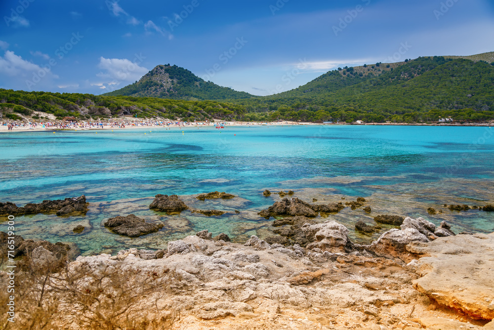 The coastal environment and crystal waters in Cala Agulla beach