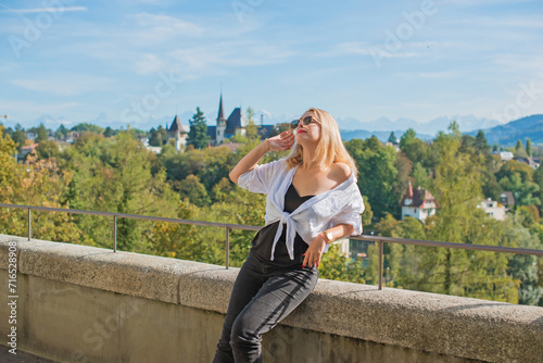 Vacation in Switzerland - Bern. Concept of tourism and holidays. Woman in city streets, urban scene © T.Den_Team