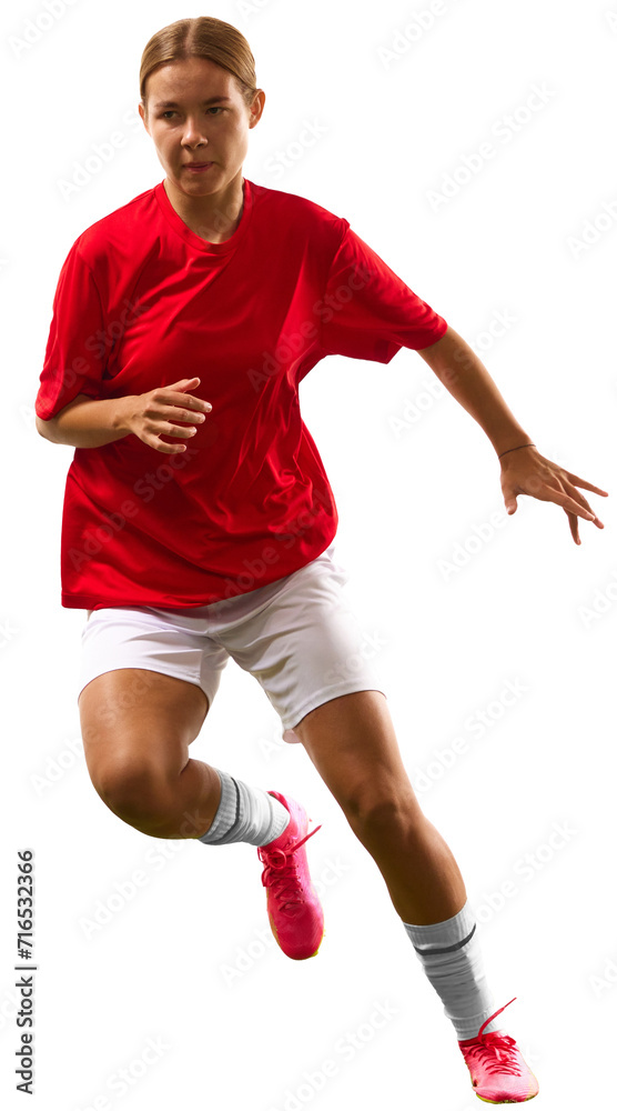 Ball dribbling. Young woman, female football player in motion during game, training isolated over transparent background. Concept of sport, competition, action, winner, tournament, active lifestyle
