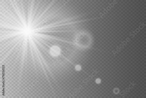 Bright beautiful white star.Light effect and flash of flickering flare. On a transparent background.