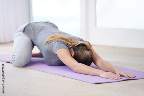 Woman, floor and yoga with fitness and stretching body for health, wellness and workout at home. Holistic, healing and mat for exercise, pilates and physical activity with self care in apartment