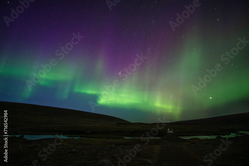 Aurora Borealis near Laugavallalaug, Iceland © inspi