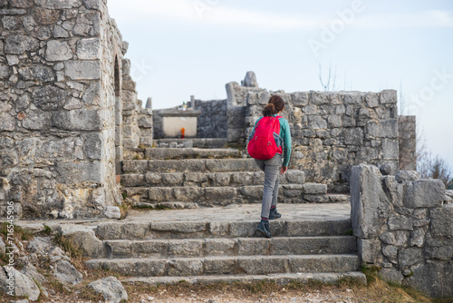 Female Person Hiker Discovery the Ruins of Saint Valentin Church on Mount Sabotin, Nova Gorica Slovenia photo