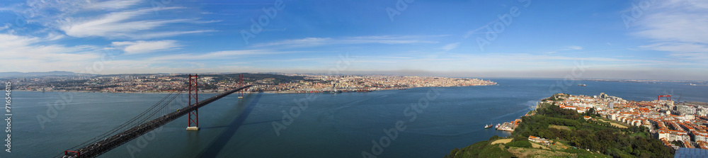 25 de Abril Bridge. One of the largest suspension bridges in the world. Connects Lisbon (top) to Almada (bottom right) over the Tagus or Tejo River. Portugal