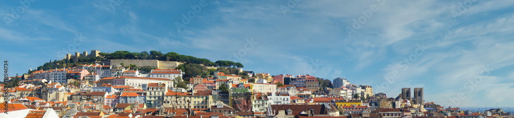 Skyline panorama of the oldest part of Lisbon with Sao Jorge Castle and Lisbon Cathedral and Alfama, Mouraria and Castelo districts. Lisbon cityscape