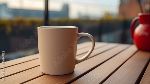 Balcony View of a beige Mug on a wooden Table. Close up with a blurred Background
