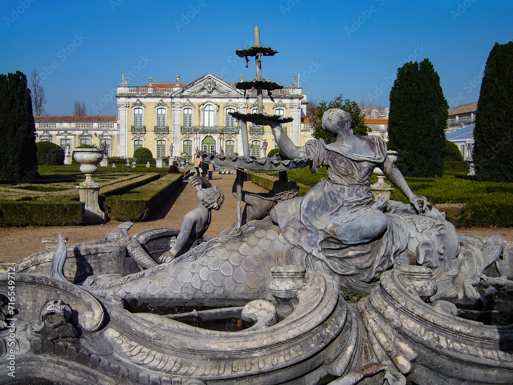 Palacio Nacional de Queluz National Palace. Amphitrite or Nereid’s Lake in Neptune Gardens. Cerimonial Facade in background. Sintra, Portugal