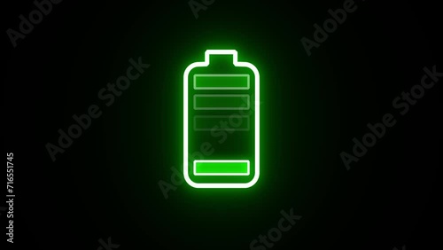 Neon battery fast charging animation, Glowing animated battery icon. Abstract sign of the neon battery charging on the black screen background. photo