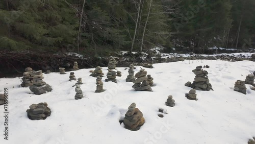 stone structures land art pyramids in the valley of the Zhenets river, Ukraine, Carpathians were left by tourists who really love these places on the way to the Guk waterfall photo