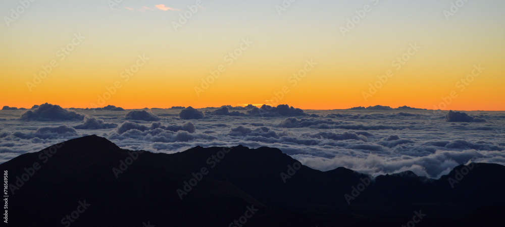 Sunrise Above the Clouds on Volcanic Landscape
Sunrise Above the Clouds on Volcanic Landscape