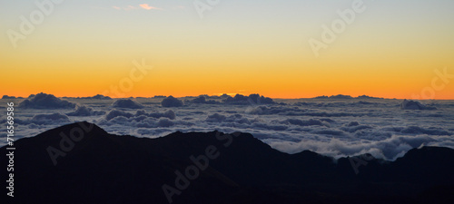 Sunrise Above the Clouds on Volcanic Landscape
 photo