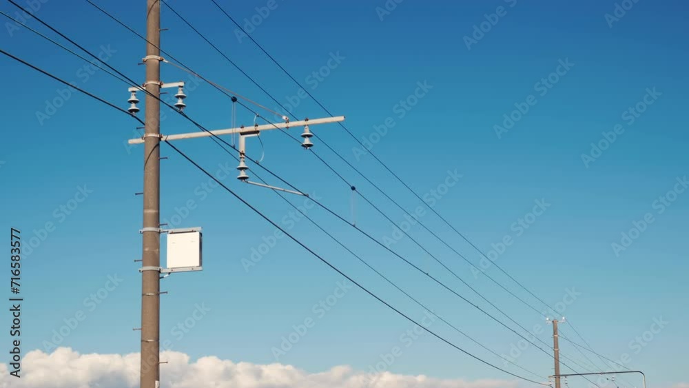 Electrical net of poles on a panorama of blue sky. Electrical net of poles on a panorama of blue sky.
