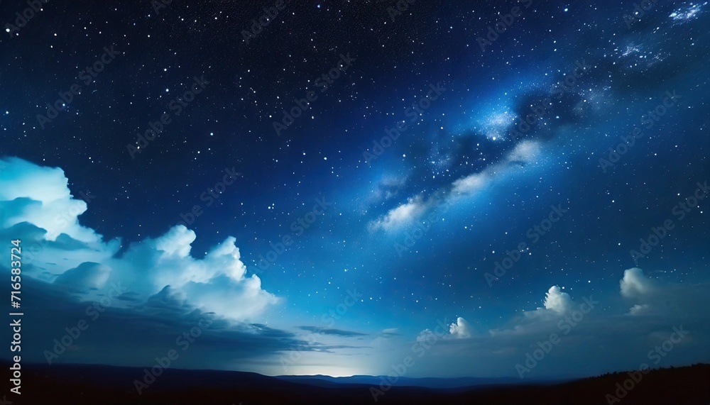 night landscape with stars and clouds in blue in 4k