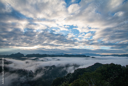 beautiful mountain mist sky scenery © noppakit rattanathon