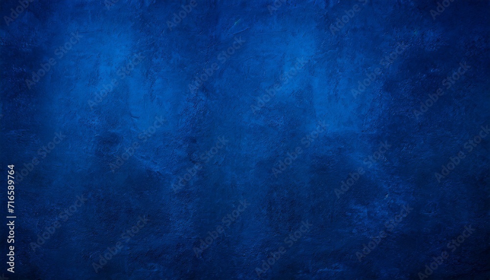 dark blue rough grainy stone or concrete wall texture background