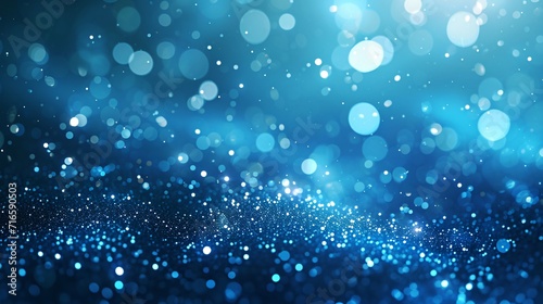 blue background with shining sparkling bokeh