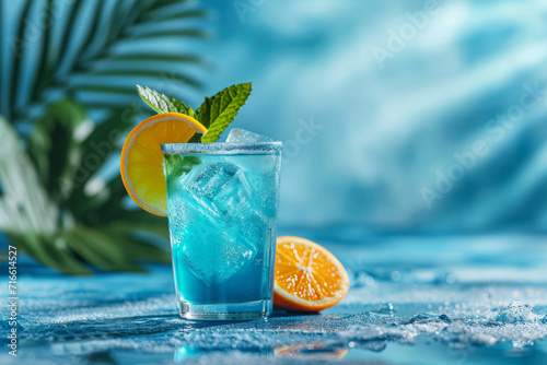Blue lagoon cocktail, light blue background. 
