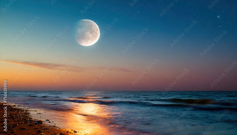 Abstract background of amazing crescent moon over the sea at sunset Abstract background of amazing crescent moon over the sea at sunset