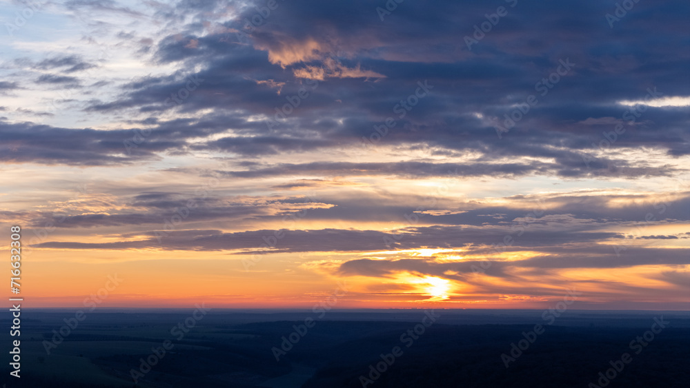 Clouds over the sunrise horizon