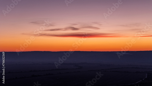 Cloud over the horizon during sunrise