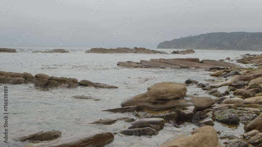 Rocks on the coast with waves. Peveril Point, Dorset, United Kingdom. Rocks on the coast with waves. Peveril Point, Dorset, United Kingdom.