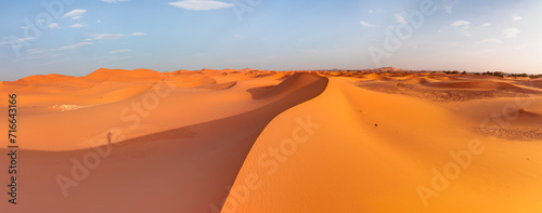 Sand dunes in the Sahara Desert at amazing sunrise  Merzouga  Morocco - Orange dunes in the desert of Morocco - Sahara desert  