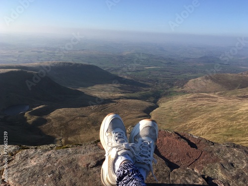 relaxing on the edge of pen y fan mountain