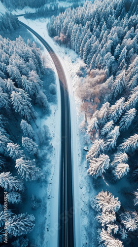 Aerial view of an asphalt road passing through a snowy forest. Winter travel concept. Generative AI © AngrySun
