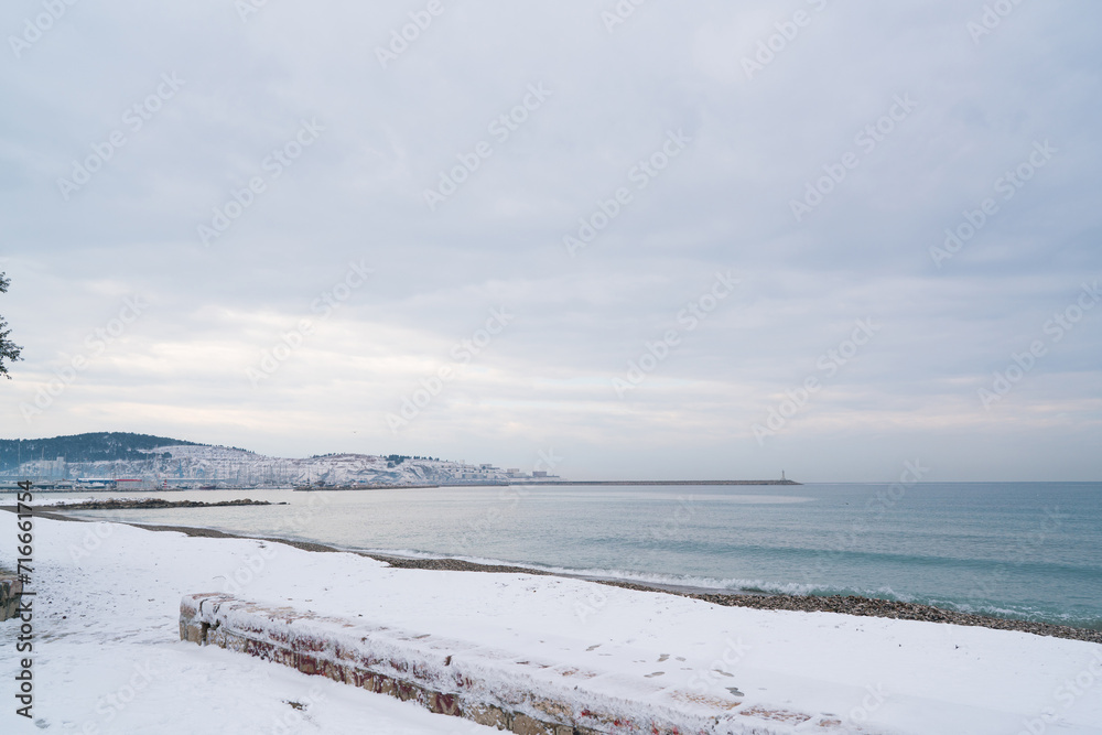 unusual weather on the Adriatic coast, snow on the beach unusual weather on the Adriatic coast, snow on the beach